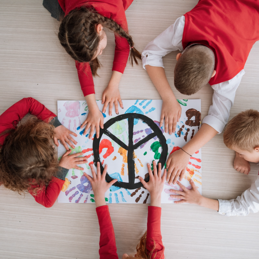 kids making a poster about peace